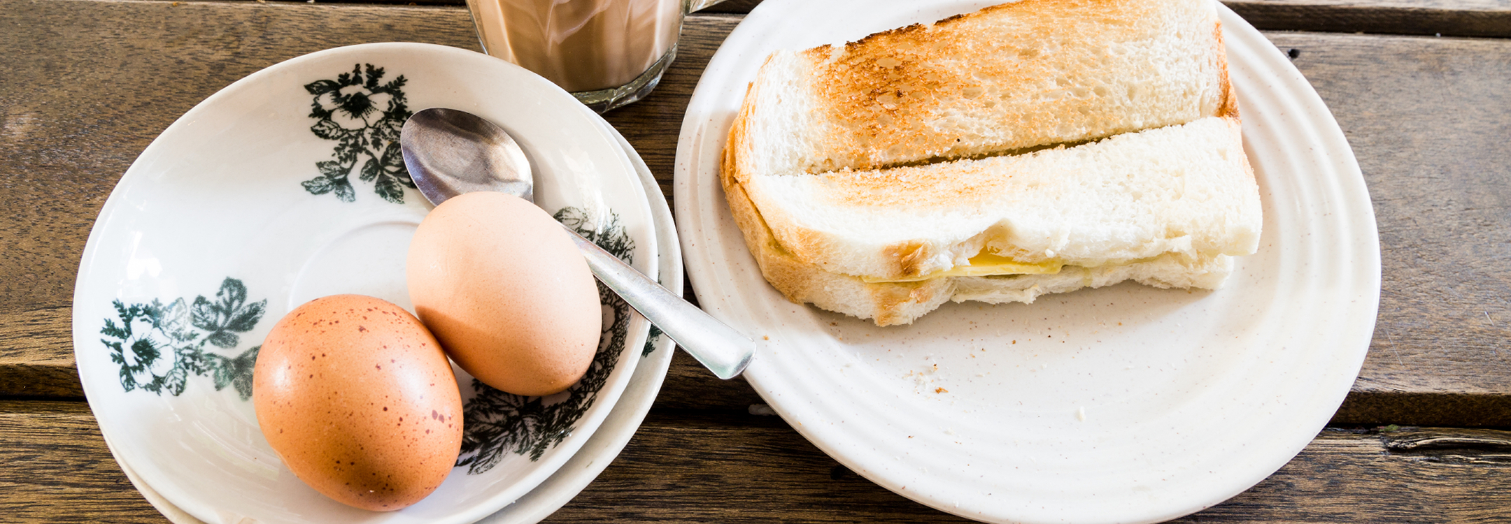 toast bread, half-boiled egg and coffee