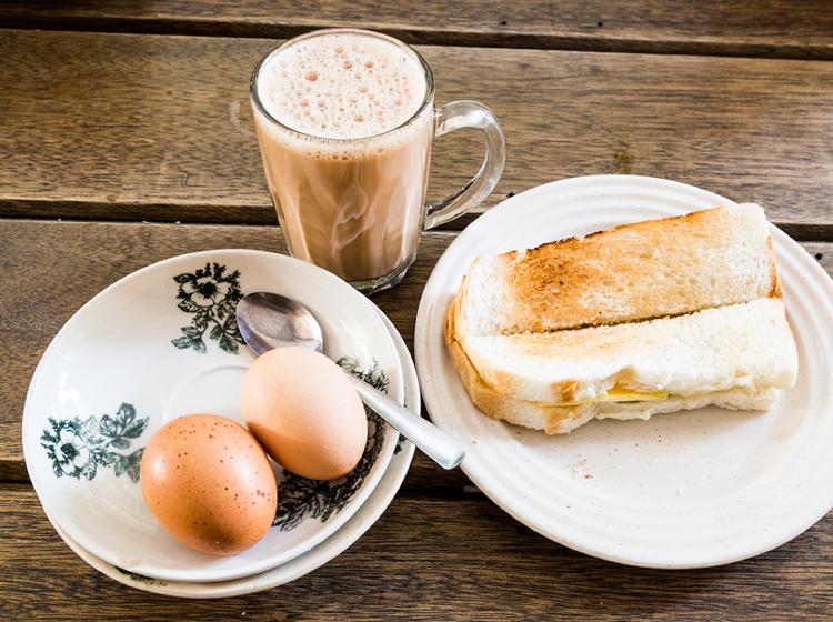 toast bread, half-boiled egg and coffee