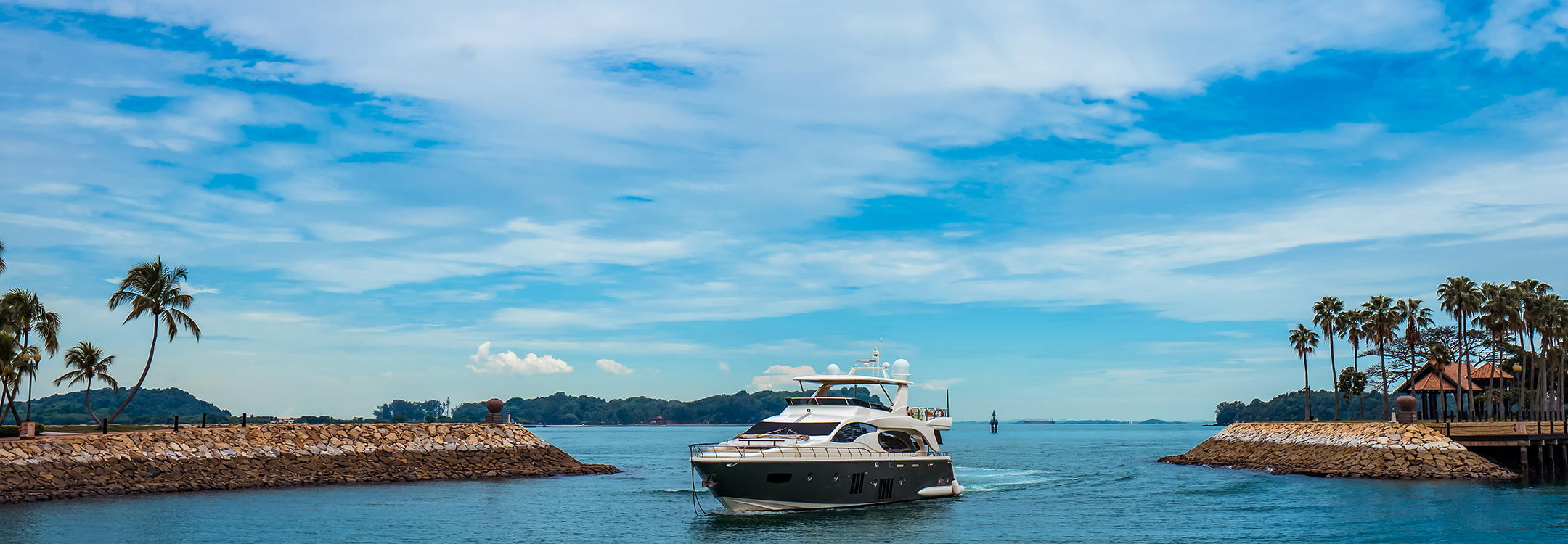 Yacht entering Sentosa Cove