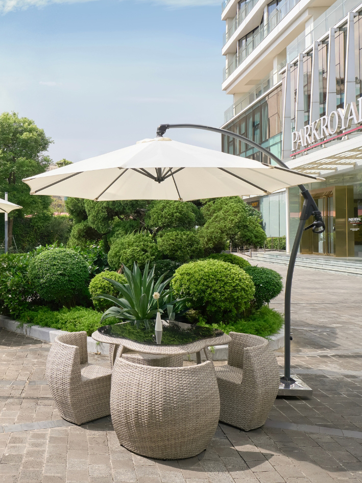 Outdoor seating area at PARKROYAL Serviced Suites Hanoi