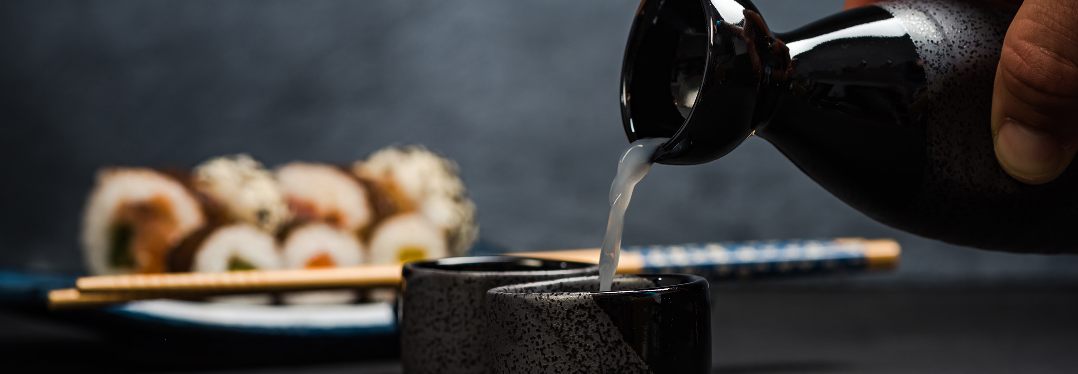 pouring sake cup