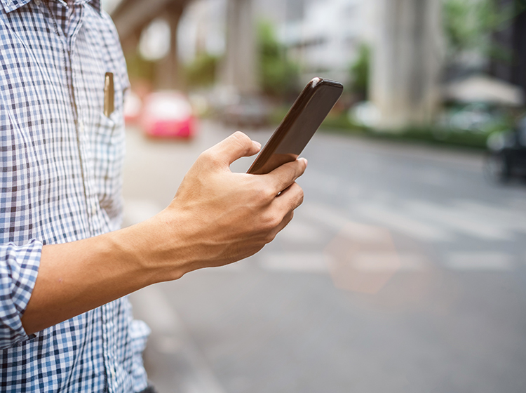 tourist using mobile phone apps