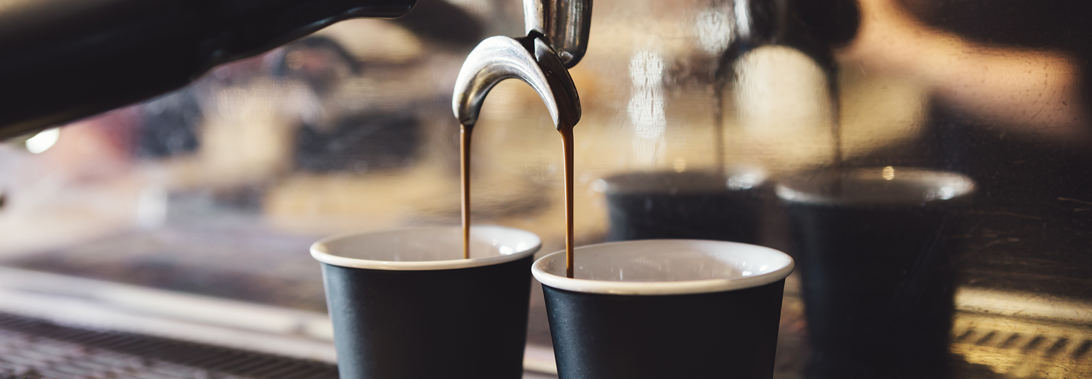 industrial coffee machine making coffee