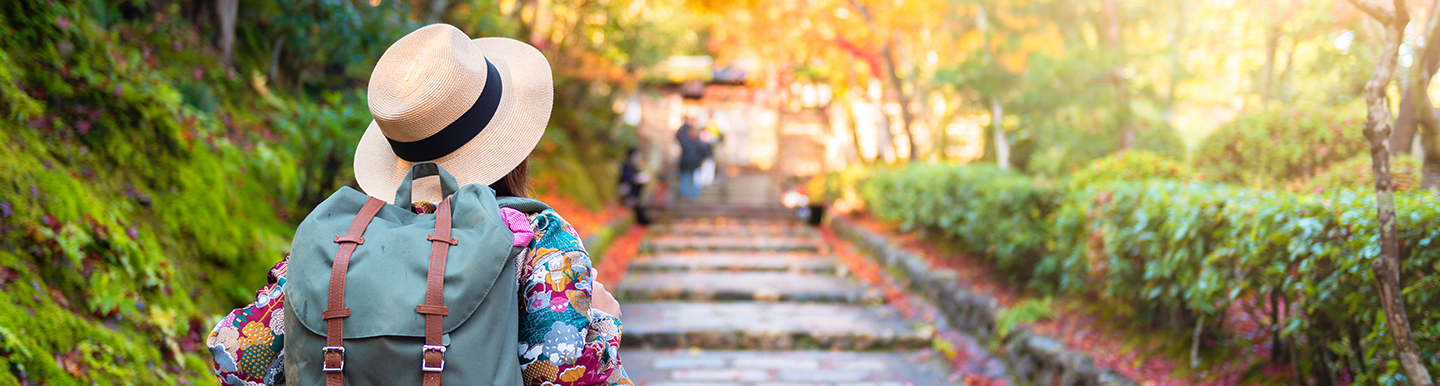 Female traveller in a park