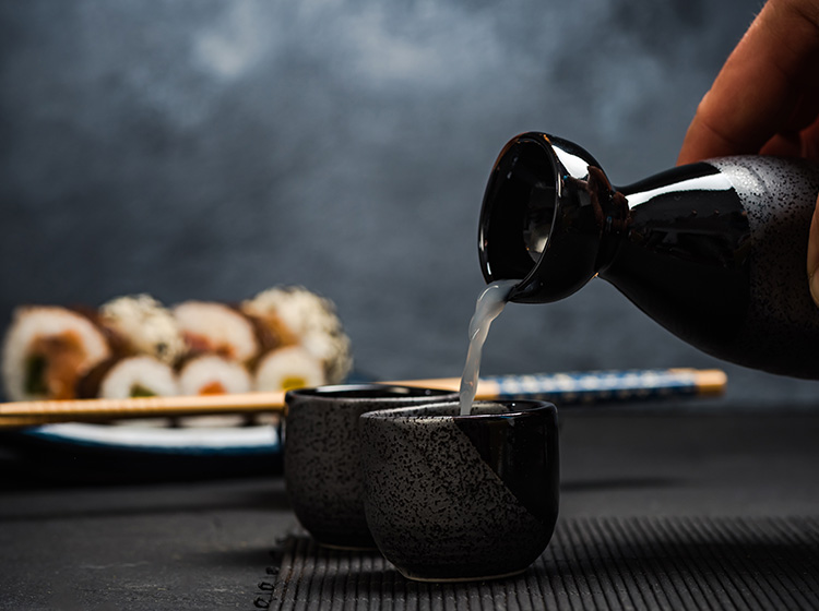 pouring sake cup