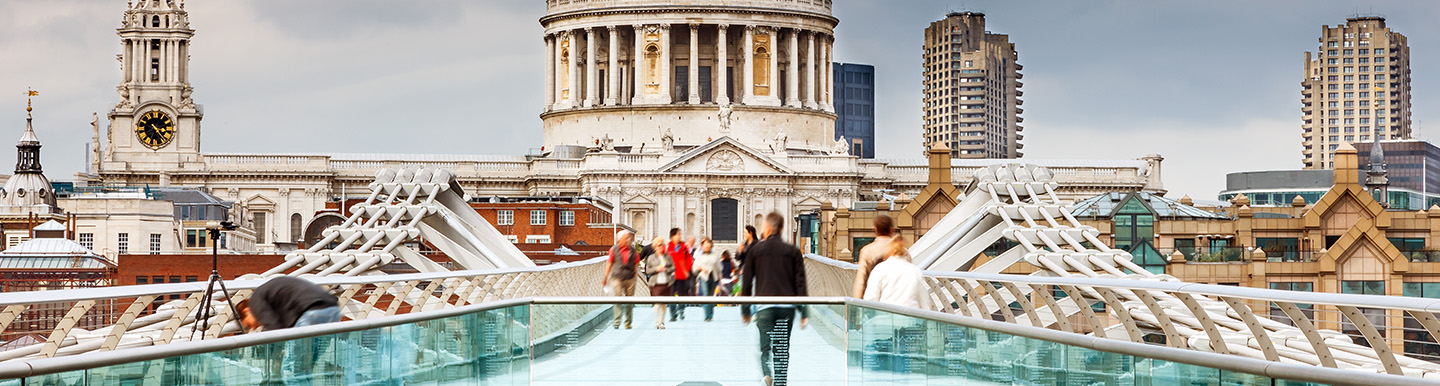 people walking with st paul cathedral in background