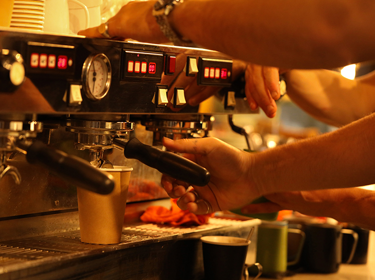 making fresh coffee with a machine