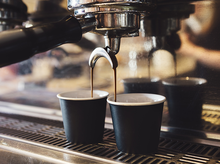 industrial coffee machine making coffee
