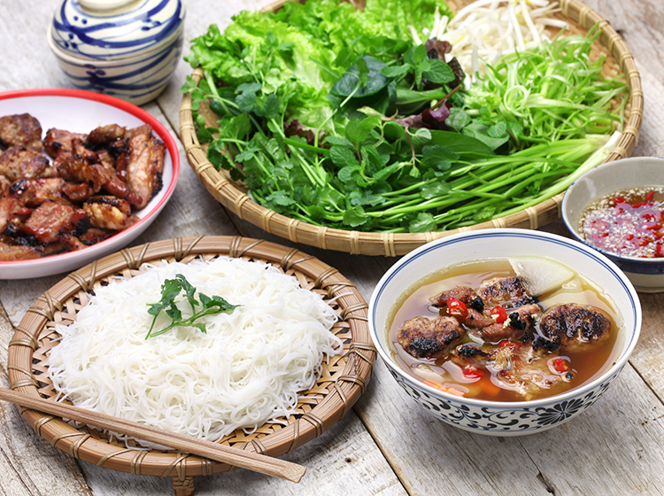 Bun Cha, with grilled pork, rice noodles and herbs
