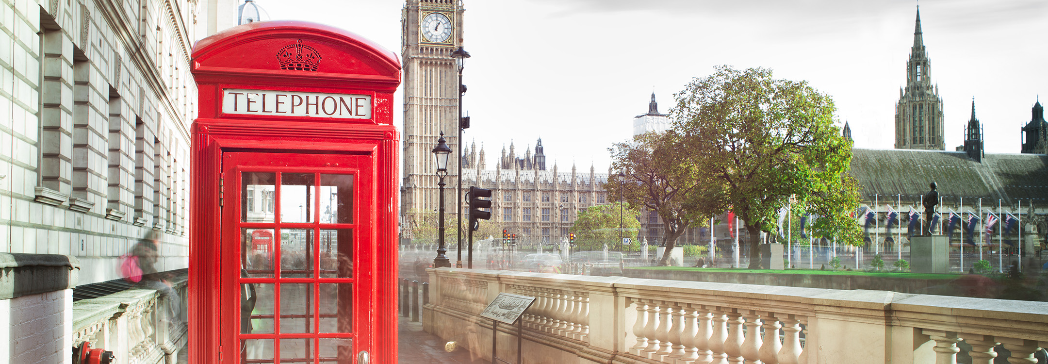 red phone booth with big ben in background