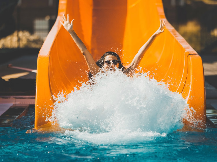 woman on a theme park water slide