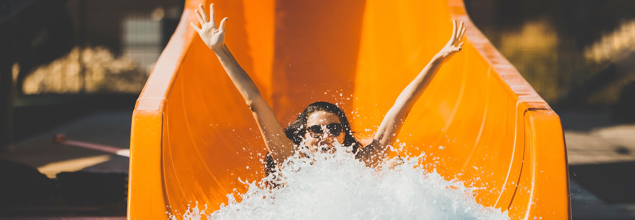 woman on a theme park water slide