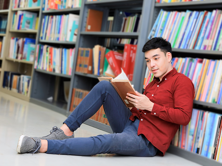Young man reading Singapore